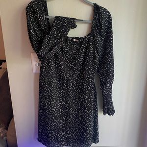 Small white polka dot black longsleeve dress